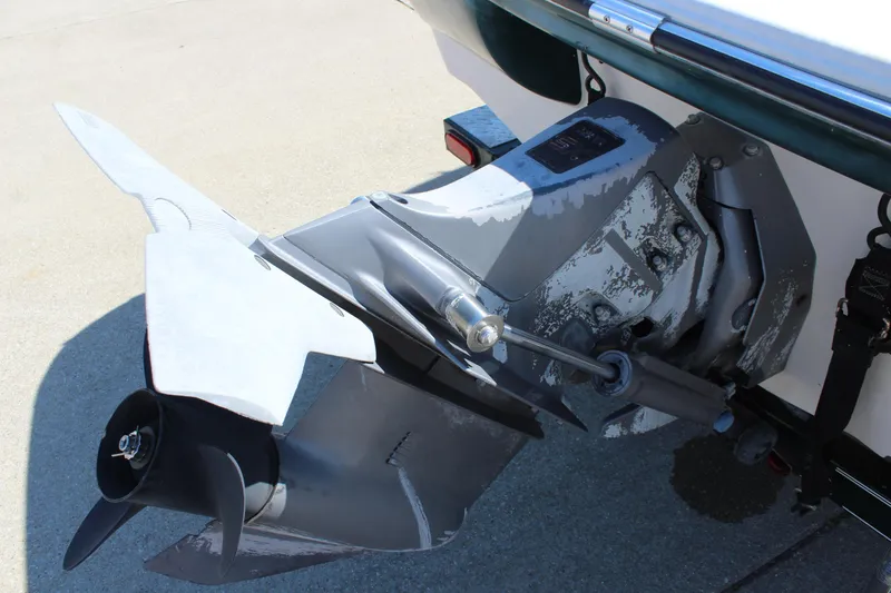 Slide: The Image of 2001 Glastron GX 185 boat propeller and outdrive close-up. - 12