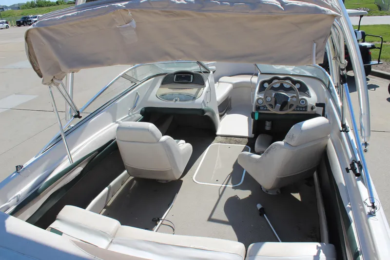 Slide: The Image of 2001 Glastron GX 185 boat interior with seating and steering console. - 15