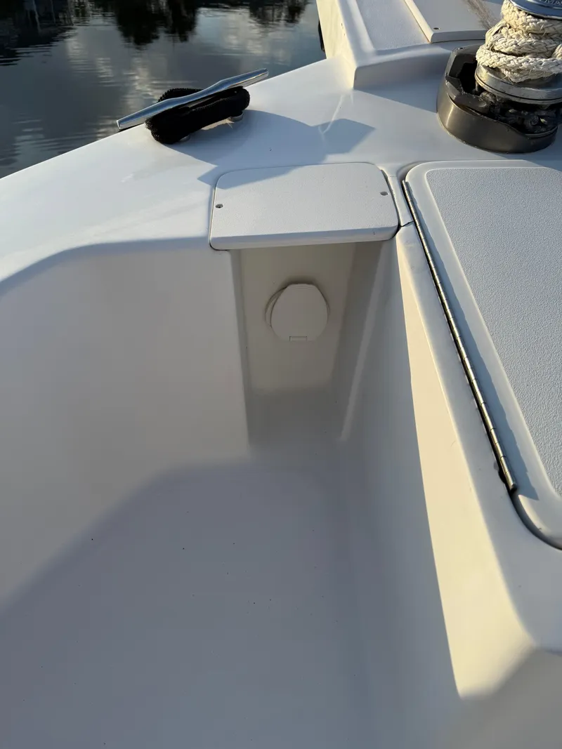 Slide: The Image of 2000 Mainship 390 Trawler deck detail with rope and fittings. - 23