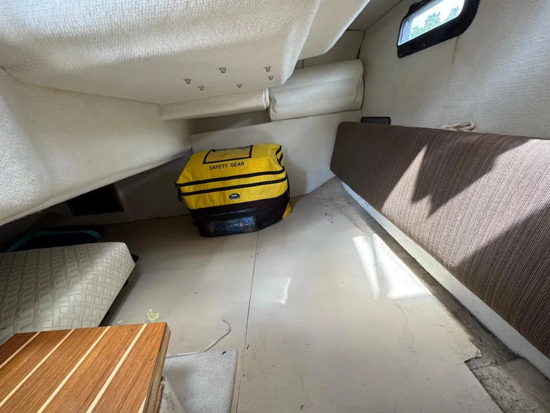 Slide: The Image of Interior cabin of a 2016 Cutwater C-26 boat with safety gear bag. - 30