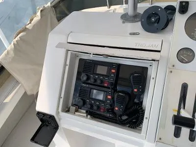 Slide: The Image of Control panel of a 1989 Trojan 12 Meter Convertible boat with communication equipment. - 15