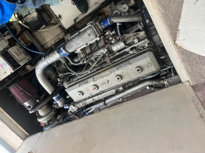 Slide: The Image of Engine of a 1989 Trojan 12 Meter Convertible boat, detailed view. - 45