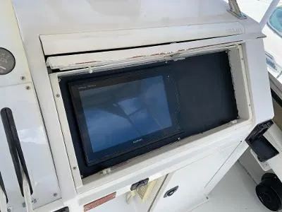 Slide: The Image of Control panel of a 1989 Trojan 12 Meter Convertible boat. - 11