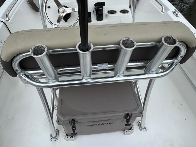 Slide: The Image of 2020 Tidewater 198 CC Adventure boat with rod holders and cooler storage. - 5