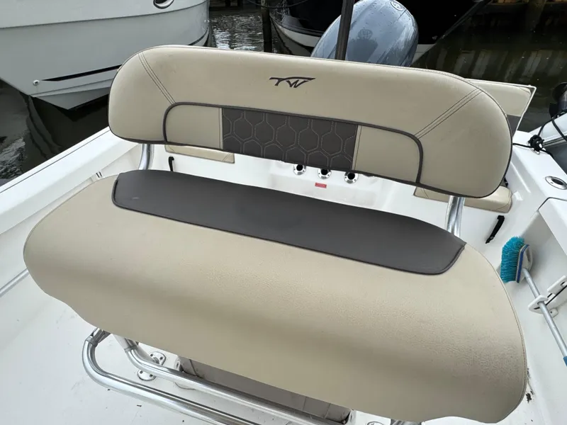 Slide: The Image of 2020 Tidewater 198 CC Adventure boat seat with beige and gray upholstery. - 7