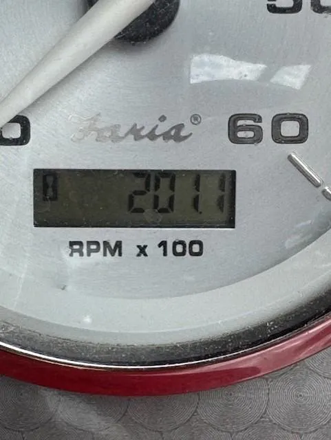 Slide: The Image of Close-up of a 2013 Rinker Captiva 220 MTX tachometer showing 2011 RPM. - 15