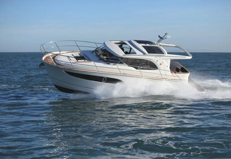 Slide: The Image of 2025 Marex 330 Scandinavia yacht cruising on open water. - 11