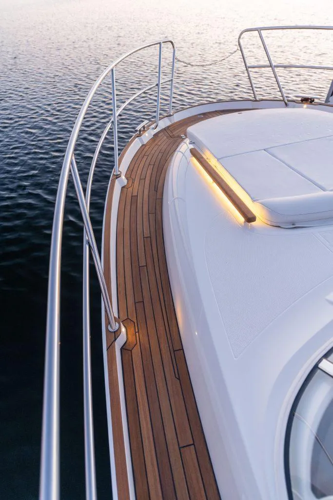 Slide: The Image of Marex 330 Scandinavia 2025 yacht deck with sleek design and wooden finish. - 16
