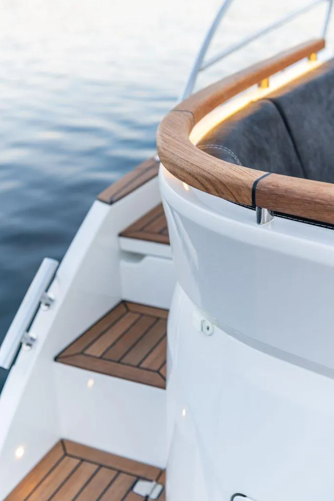 Slide: The Image of 2025 Marex 330 Scandinavia boat with elegant wooden deck and modern design. - 18