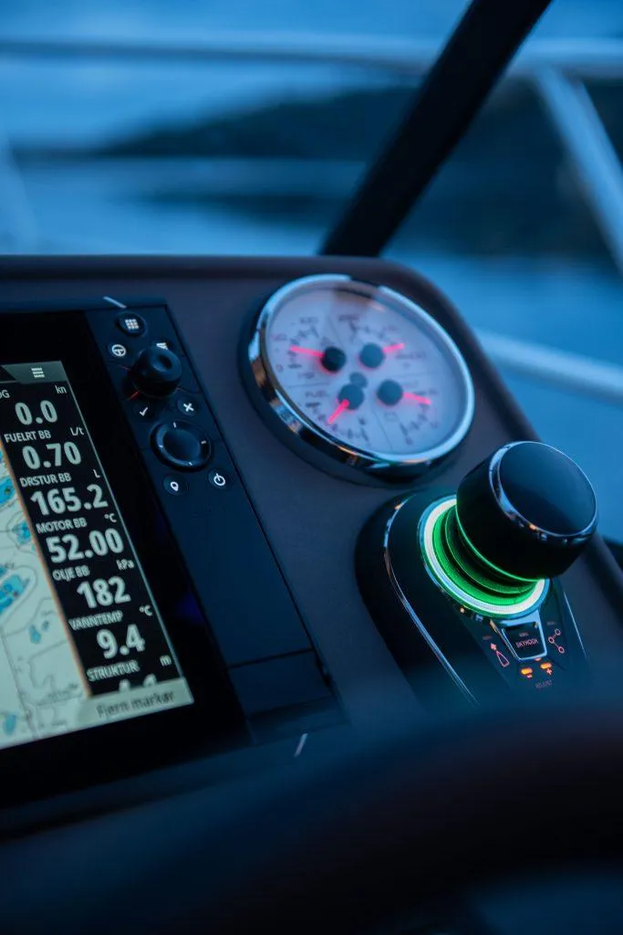 Slide: The Image of Control panel of 2025 Marex 330 Scandinavia boat, featuring navigation and speed gauges. - 20