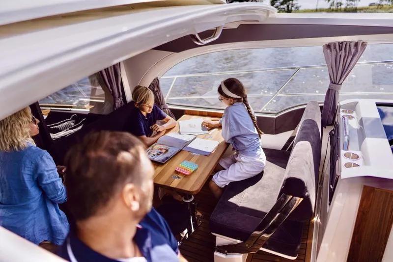 Slide: The Image of Family enjoying leisure time on 2025 Marex 330 Scandinavia yacht interior. - 27