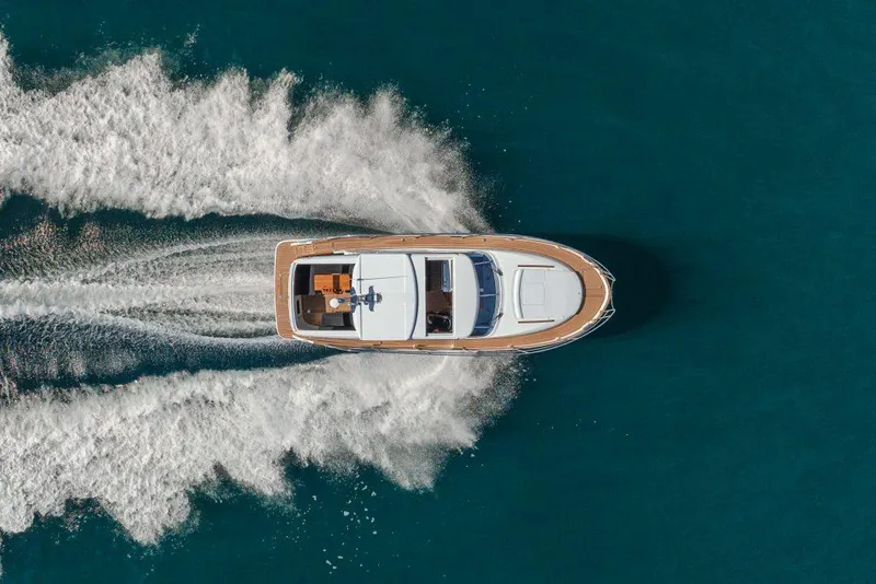 Slide: The Image of Aerial view of 2025 Marex 330 Scandinavia yacht cruising on blue water. - 49