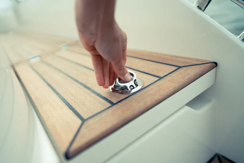 Slide: The Image of Hand operating hatch on 2025 Marex 330 Scandinavia boat deck. - 39
