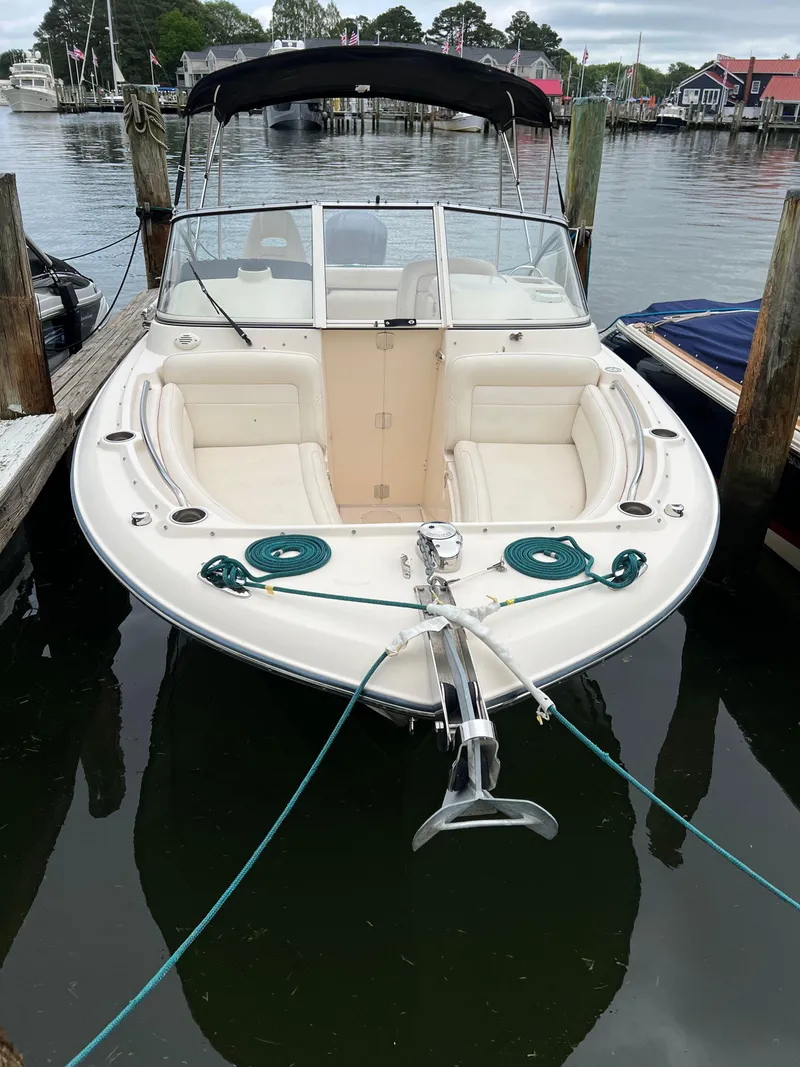 Slide: The Image of 2019 Grady-White Freedom 255 boat docked in a marina. - 33