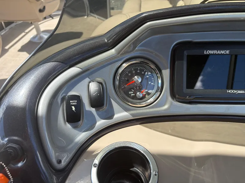 Slide: The Image of Dashboard of 2022 Sun Tracker Party Barge 24 DLX with gauges and Lowrance display. - 14