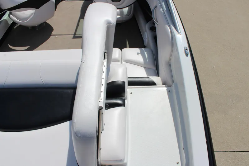 Slide: The Image of 2012 Crownline 21 SS boat interior with white seating and sleek design. - 10