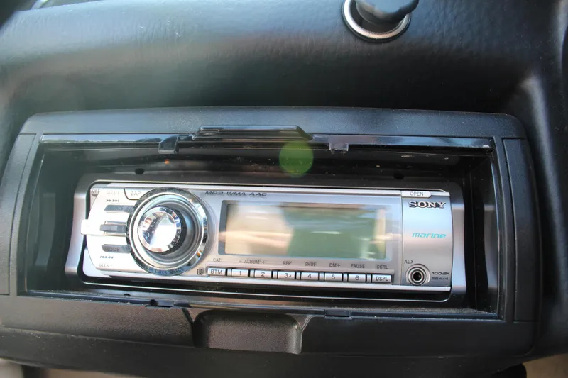Slide: The Image of Sony marine stereo installed in a 2012 Crownline 21 SS boat dashboard. - 20