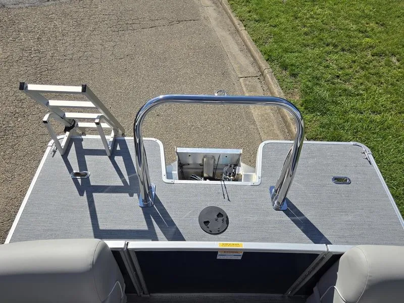 Slide: The Image of 2025 Godfrey Xperience 2286 SBX Sport Tube boat deck with ladder and railing. - 14