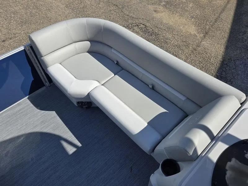 Slide: The Image of 2025 Godfrey Xperience 2286 SBX Sport Tube boat with sleek gray seating. - 7