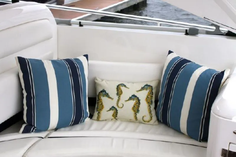 Slide: The Image of Luxurious seating with striped and seahorse pillows on a 2007 Fairline Targa 52 yacht. - 20
