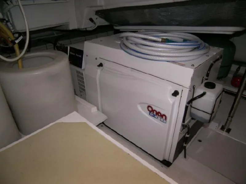 Slide: The Image of Engine room of 2007 Fairline Targa 52 yacht with Onan generator and equipment. - 25