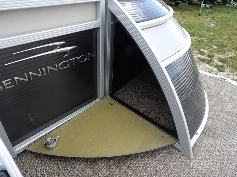 Slide: The Image of 2016 Bennington 2874 QSR pontoon boat with sleek design and modern features. - 12
