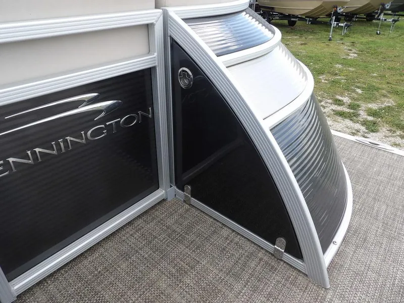 Slide: The Image of 2016 Bennington 2874 QSR pontoon boat detail with sleek design and modern finishes. - 13