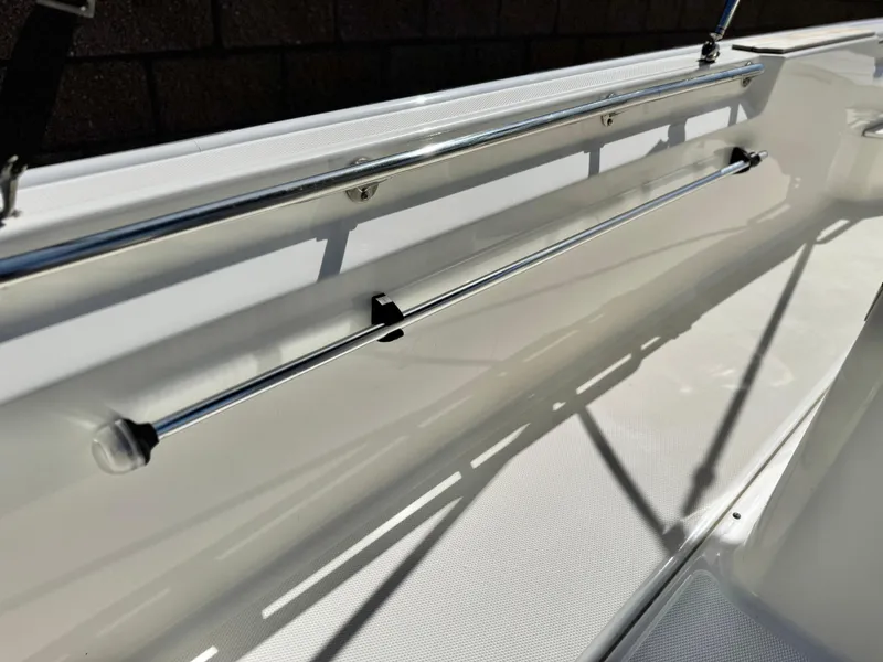 Slide: The Image of 2021 Boston Whaler 170 Montauk interior detail with stainless steel railing. - 15
