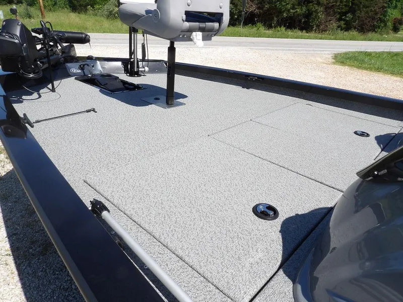 Slide: The Image of 2020 G3 Sportsman 1810 boat deck with seating and storage compartments. - 10