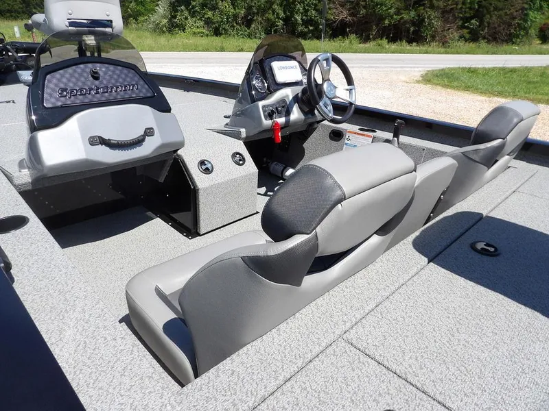 Slide: The Image of 2020 G3 Sportsman 1810 boat interior with steering console and seating. - 11