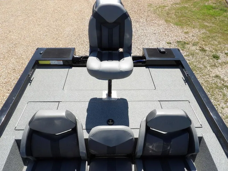 Slide: The Image of 2020 G3 Sportsman 1810 boat interior with four gray seats on deck. - 12
