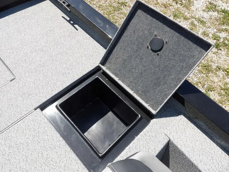 Slide: The Image of Open storage compartment on 2020 G3 Sportsman 1810 boat deck. - 13