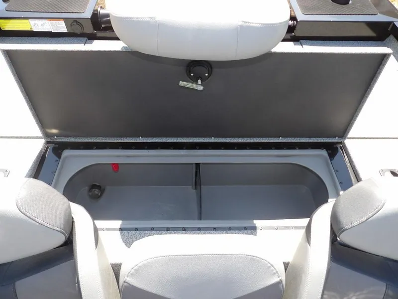 Slide: The Image of 2020 G3 Sportsman 1810 boat storage compartment with open lid and seating. - 14