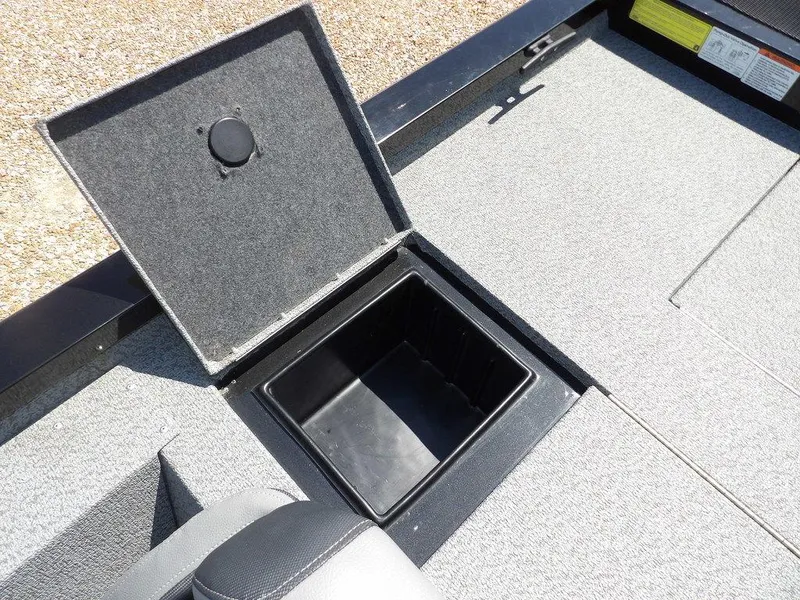 Slide: The Image of 2020 G3 Sportsman 1810 boat storage compartment with open lid, showcasing interior space. - 15