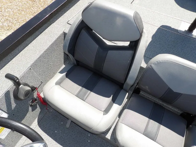 Slide: The Image of 2020 G3 Sportsman 1810 boat seats, gray upholstery, steering wheel visible. - 26