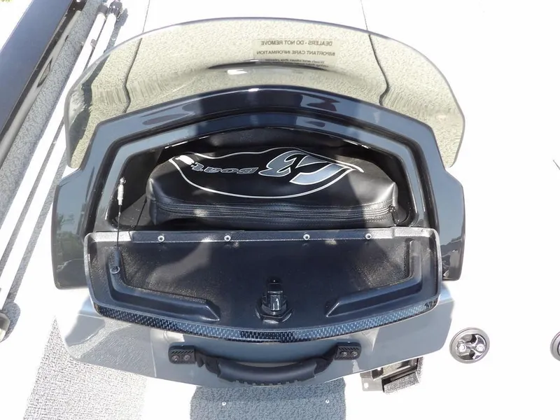 Slide: The Image of 2020 G3 Sportsman 1810 boat storage compartment with protective cover. - 27