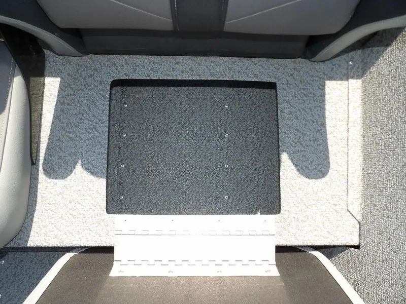 Slide: The Image of 2020 G3 Sportsman 1810 boat interior with carpeted flooring and storage compartment. - 30