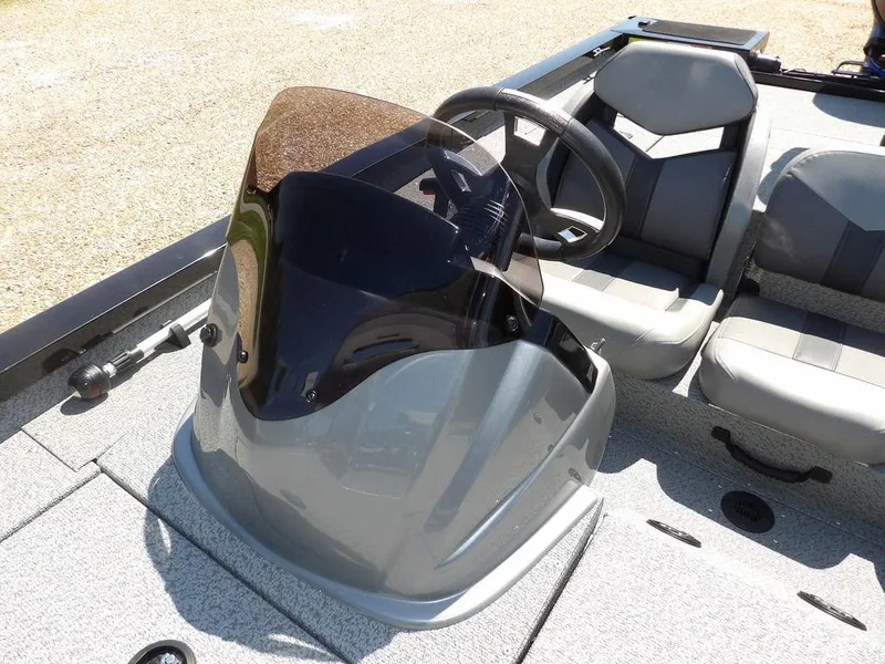 Slide: The Image of 2020 G3 Sportsman 1810 boat interior with steering console and seating. - 31