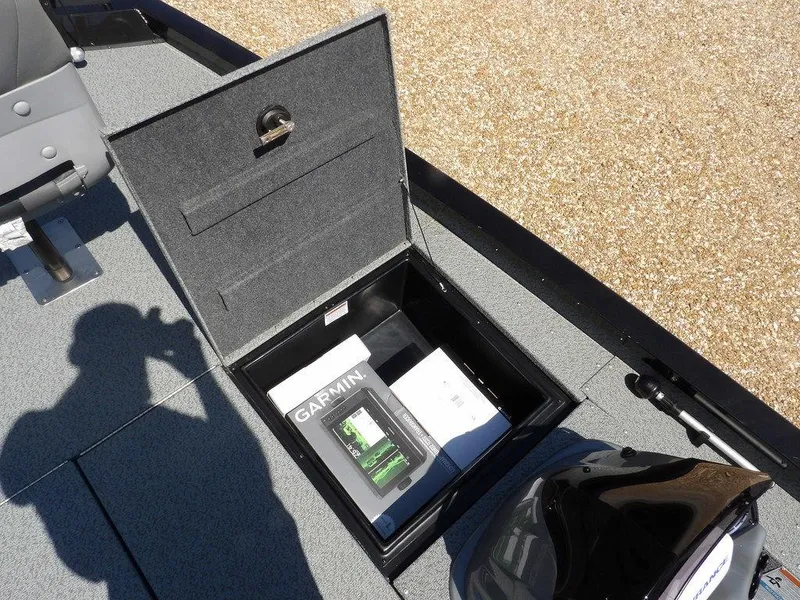 Slide: The Image of 2020 G3 Sportsman 1810 boat storage compartment with Garmin equipment inside. - 36