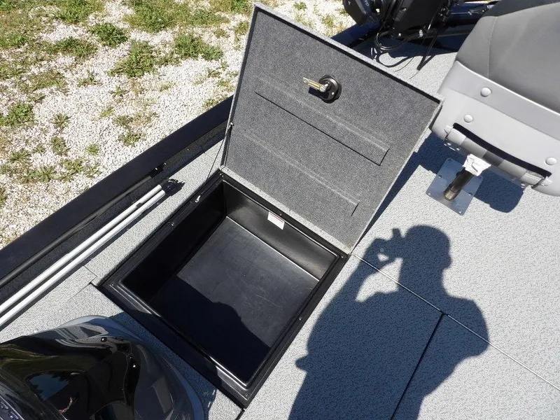 Slide: The Image of Open storage compartment on 2020 G3 Sportsman 1810 boat deck. - 37