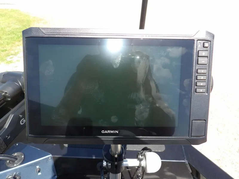 Slide: The Image of Garmin display on 2020 G3 Sportsman 1810 boat, reflecting sunlight. - 42