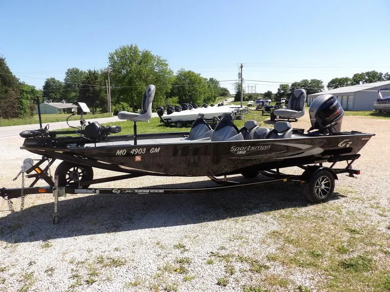 Slide: The Image of 2020 G3 Sportsman 1810 boat on trailer, parked outdoors on gravel. - 5
