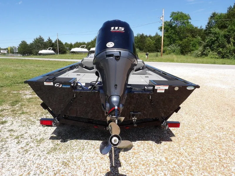 Slide: The Image of 2020 G3 Sportsman 1810 boat with 115 HP engine, parked on gravel. - 8