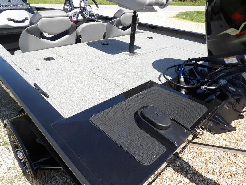 Slide: The Image of 2020 G3 Sportsman 1810 boat interior with seating and control panel. - 9