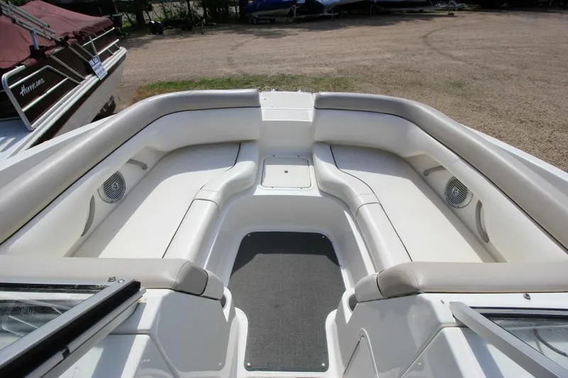 Slide: The Image of 2013 Bayliner 190 Deck Boat interior with spacious seating and clean design. - 19