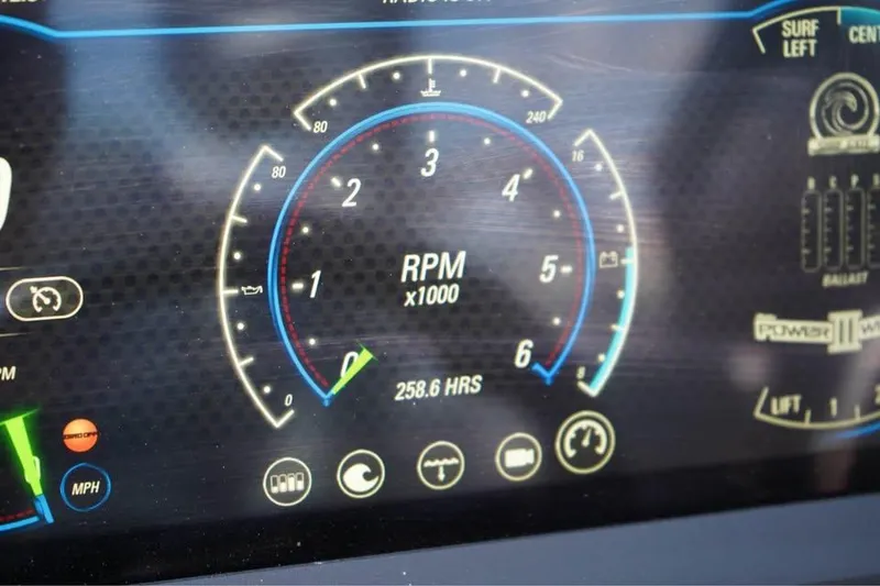 Slide: The Image of Digital dashboard of 2022 Malibu Wakesetter 25 LSV showing RPM and engine hours. - 19