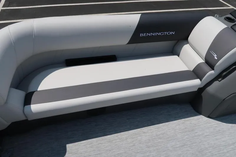 Slide: The Image of 2025 Bennington S L-Bench 20 SL boat seating, featuring sleek gray and black upholstery. - 12