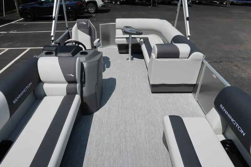 Slide: The Image of 2025 Bennington S L-Bench 20 SL pontoon boat with spacious seating and modern design. - 13
