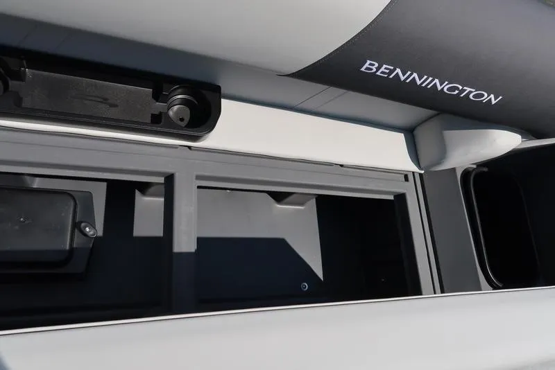 Slide: The Image of 2025 Bennington S L-Bench 20 SL boat storage compartment detail. - 7