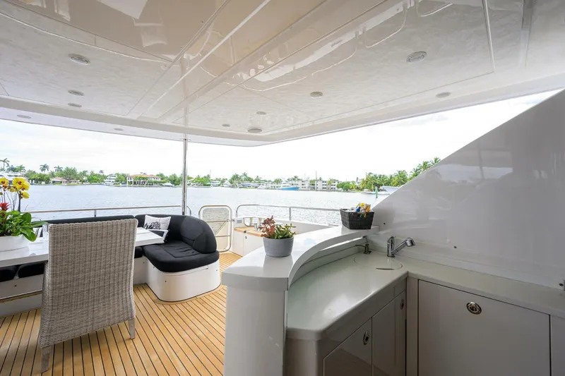 Slide: The Image of Luxurious 2009 Princess 95 yacht deck with seating and scenic water view. - 28